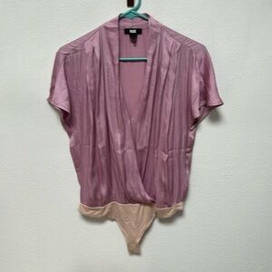 Silk bodysuit top by Paige